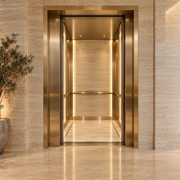 Champagne elevator with warm stone finishes